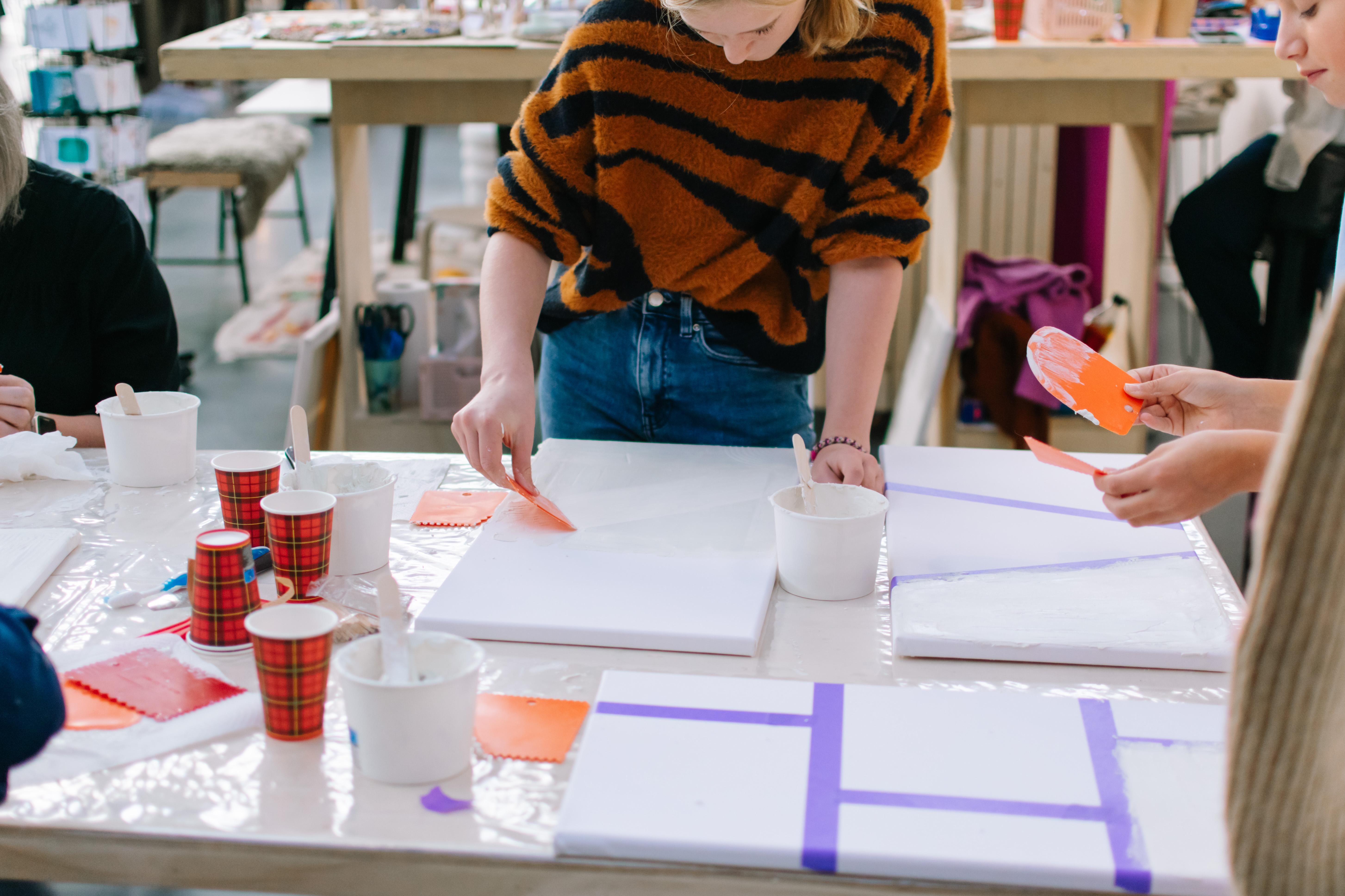 Textuurschilderen op canvas voor events - Foto
